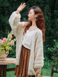 Áo cardigan nữ dệt thủ công tay phồng phong cách lười, dáng rộng dễ phối cho mùa thu đông